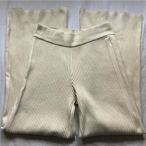 Aerie Cream Ribbed high-waisted wide leg flare cozy knit pants
Size: Medium